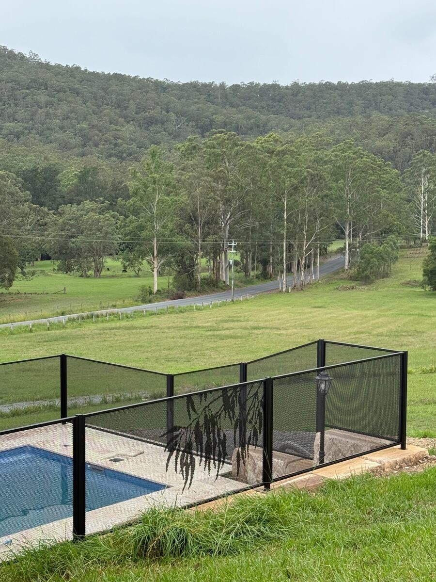 Gum design pool fence corner with paddock views, NSW Mid North Coast